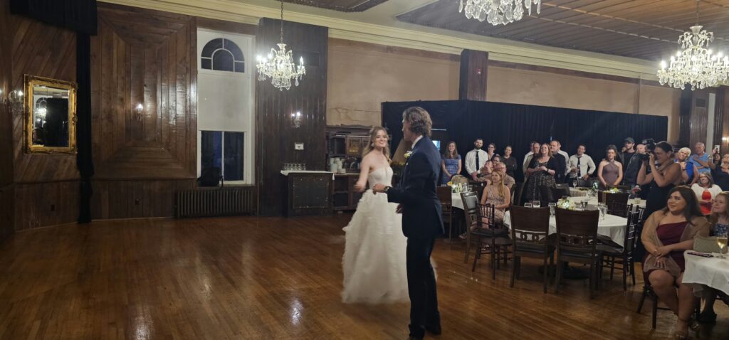 Jessie and Ashley sharing their first dance at the Crescent Hotel Crystal Ballroom wedding