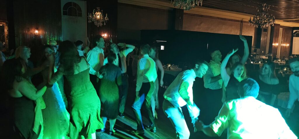 Crescent Hotel Wedding Crystal Ballroom Guests dancing on a packed dance floor